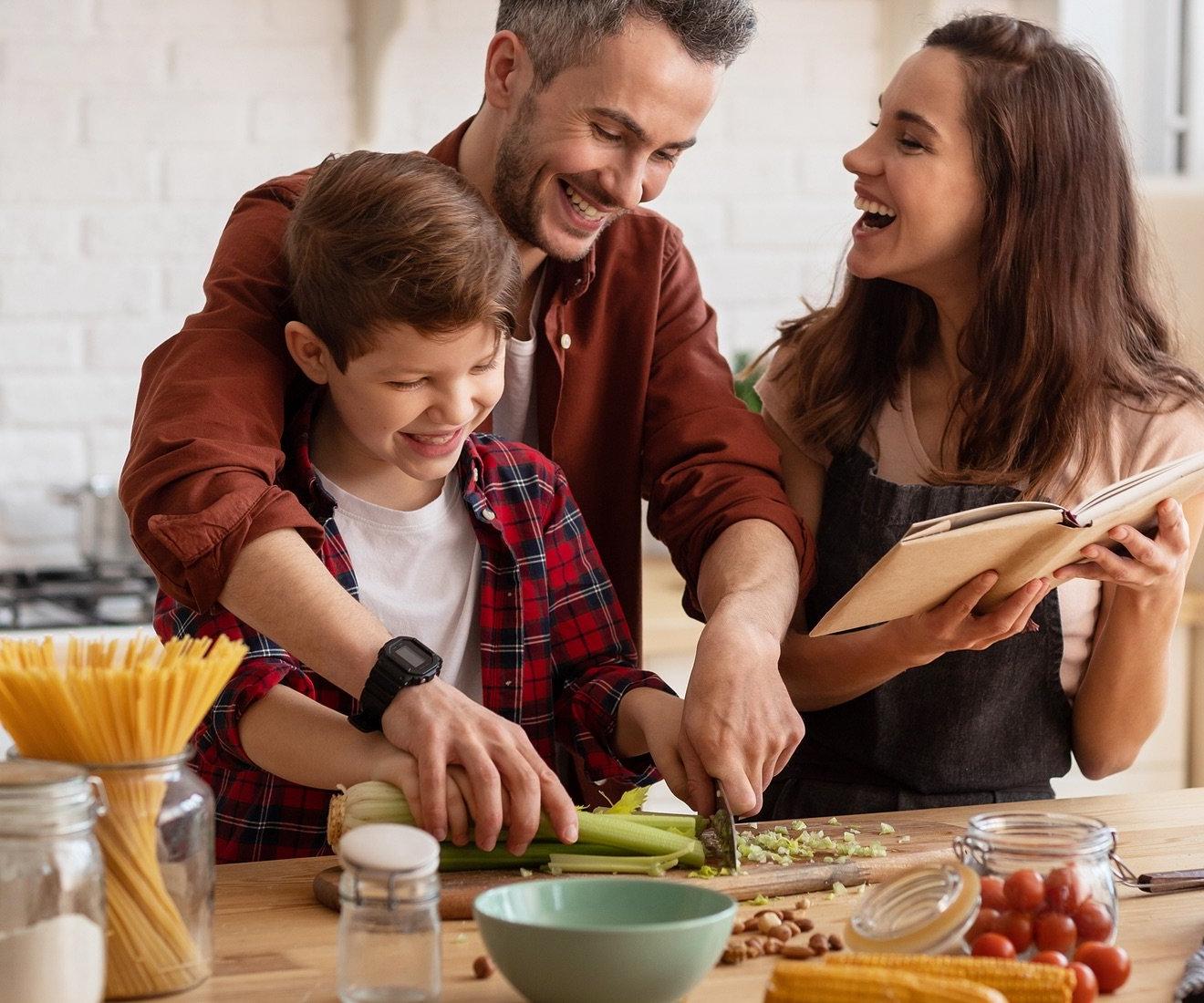 Family cooking dinner together.